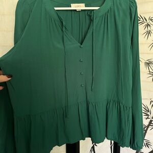 Green Loft blouse with faux buttons and ruffle edge. New never worn.